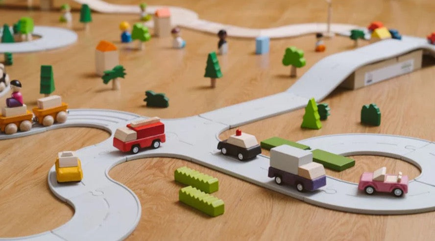 plants vehicles on rubber road track