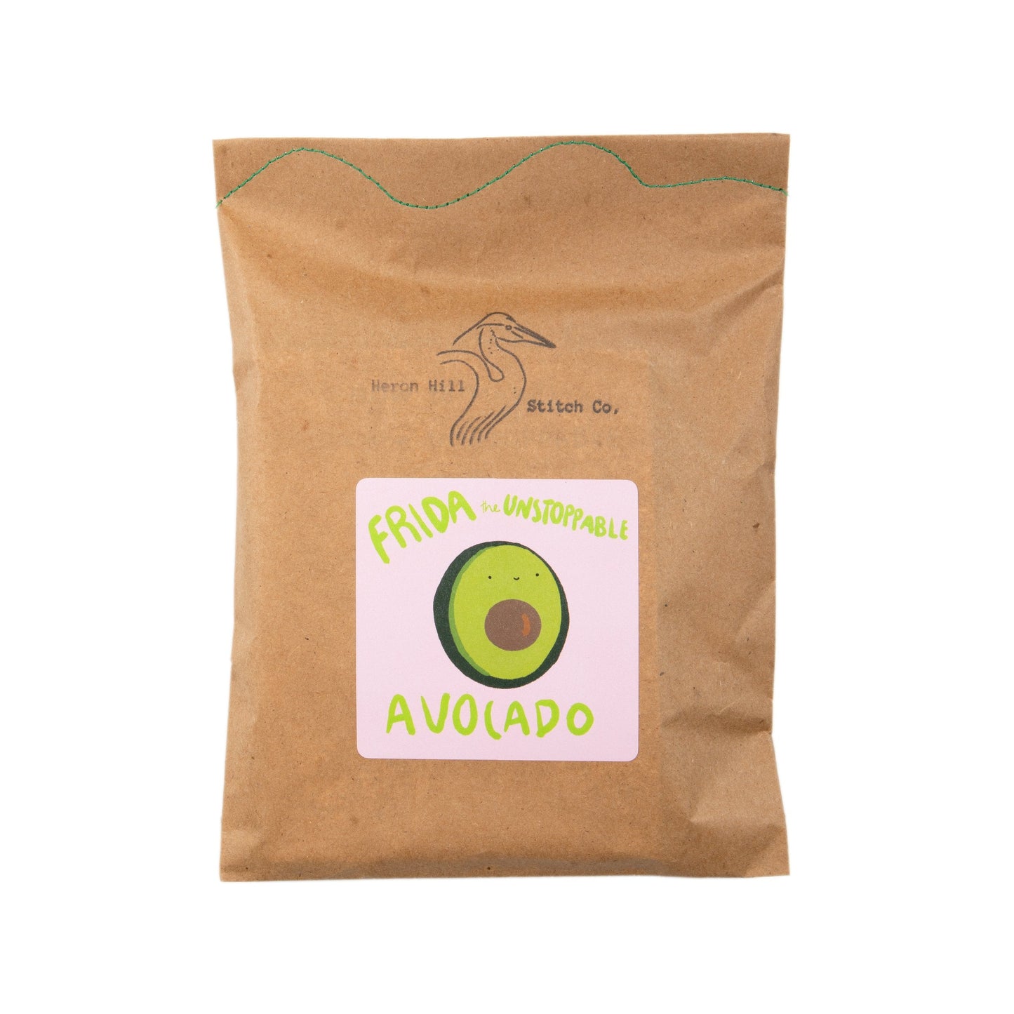 Brown paper bag with a label featuring an avocado illustration on a white background