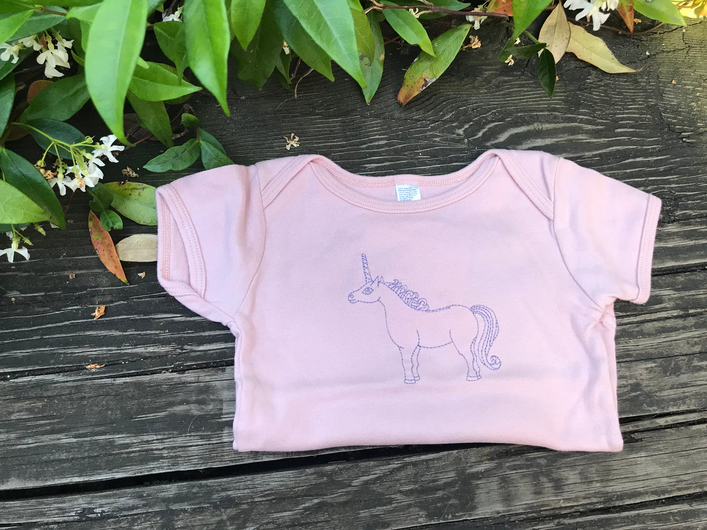 purple/pink unicorn baby tee