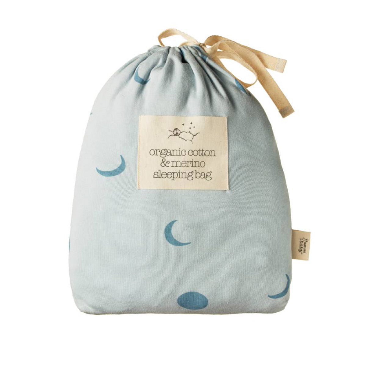 Organic cotton and merino wool sleeping bag in a drawstring bag with a label on a white background