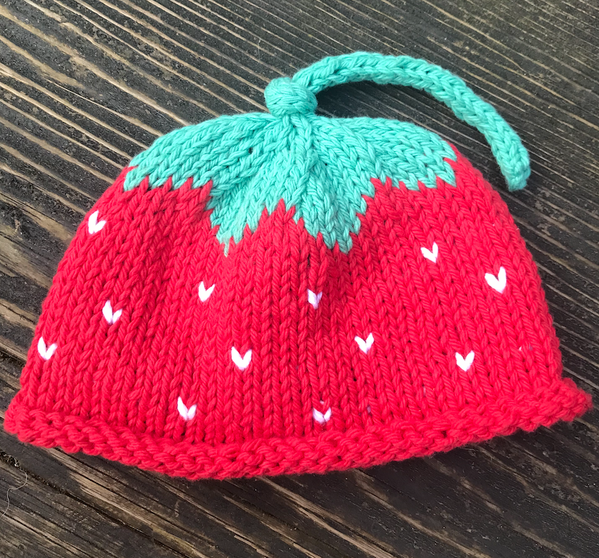handknit organic strawberry hat in baby size