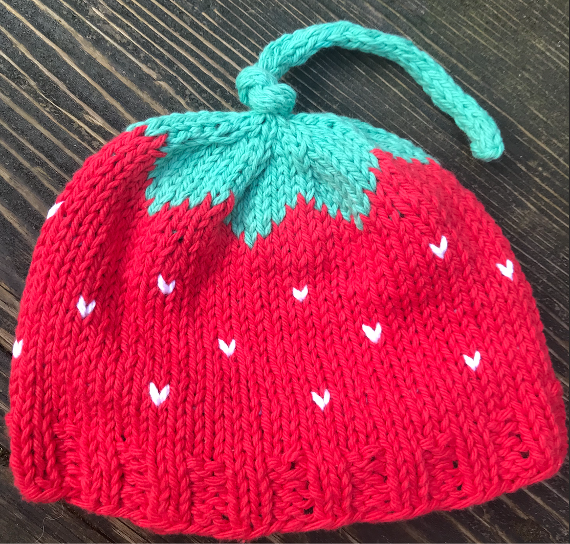 handknit organic strawberry hat in toddler size