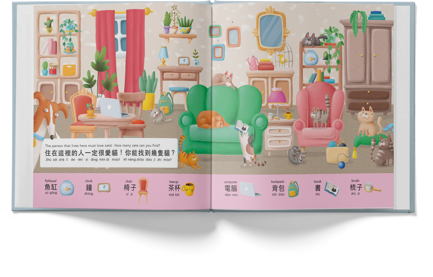Illustrated book open to a page with a living room scene and cat illustrations.