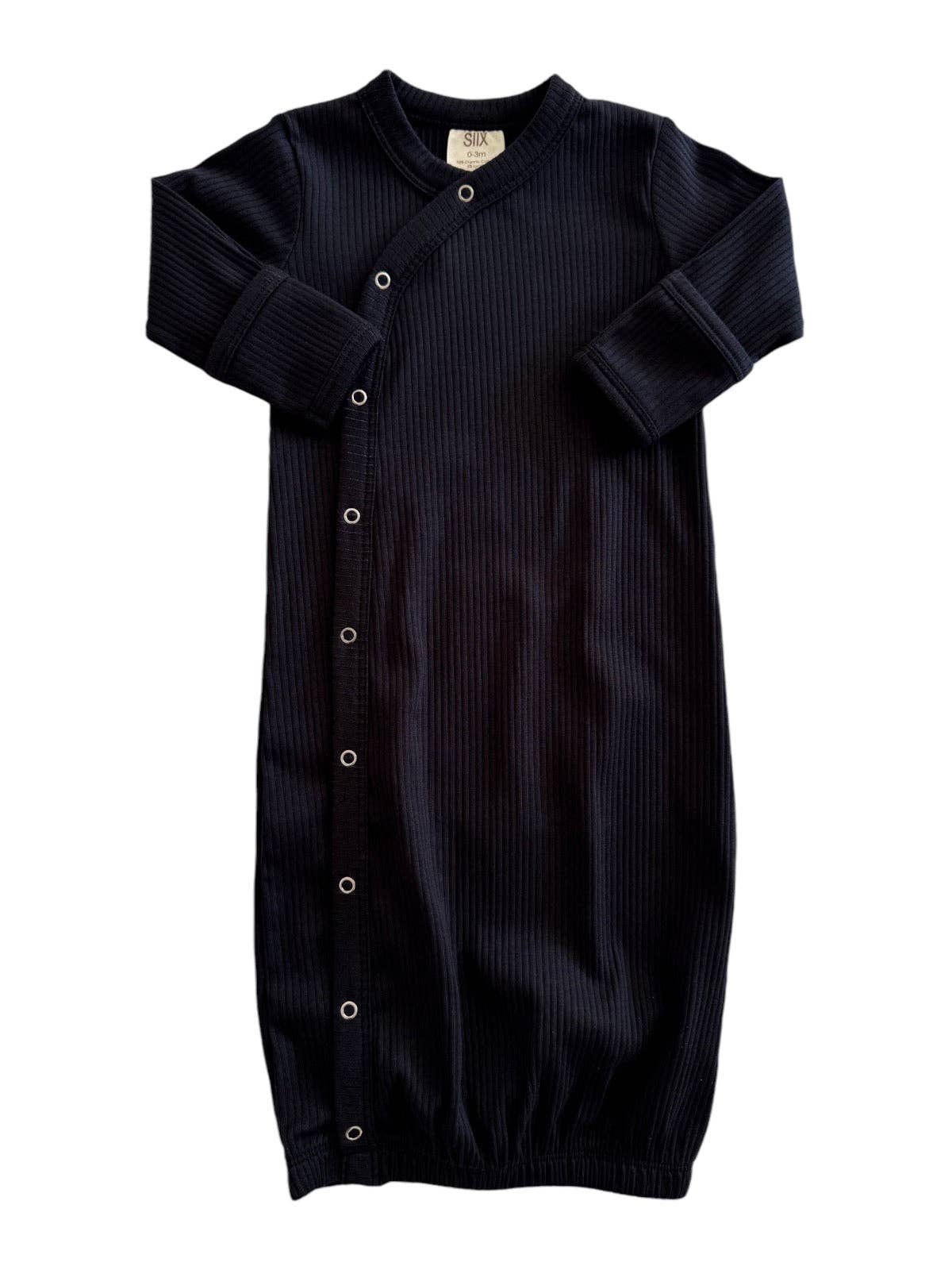 Black baby gown with snaps on a white background