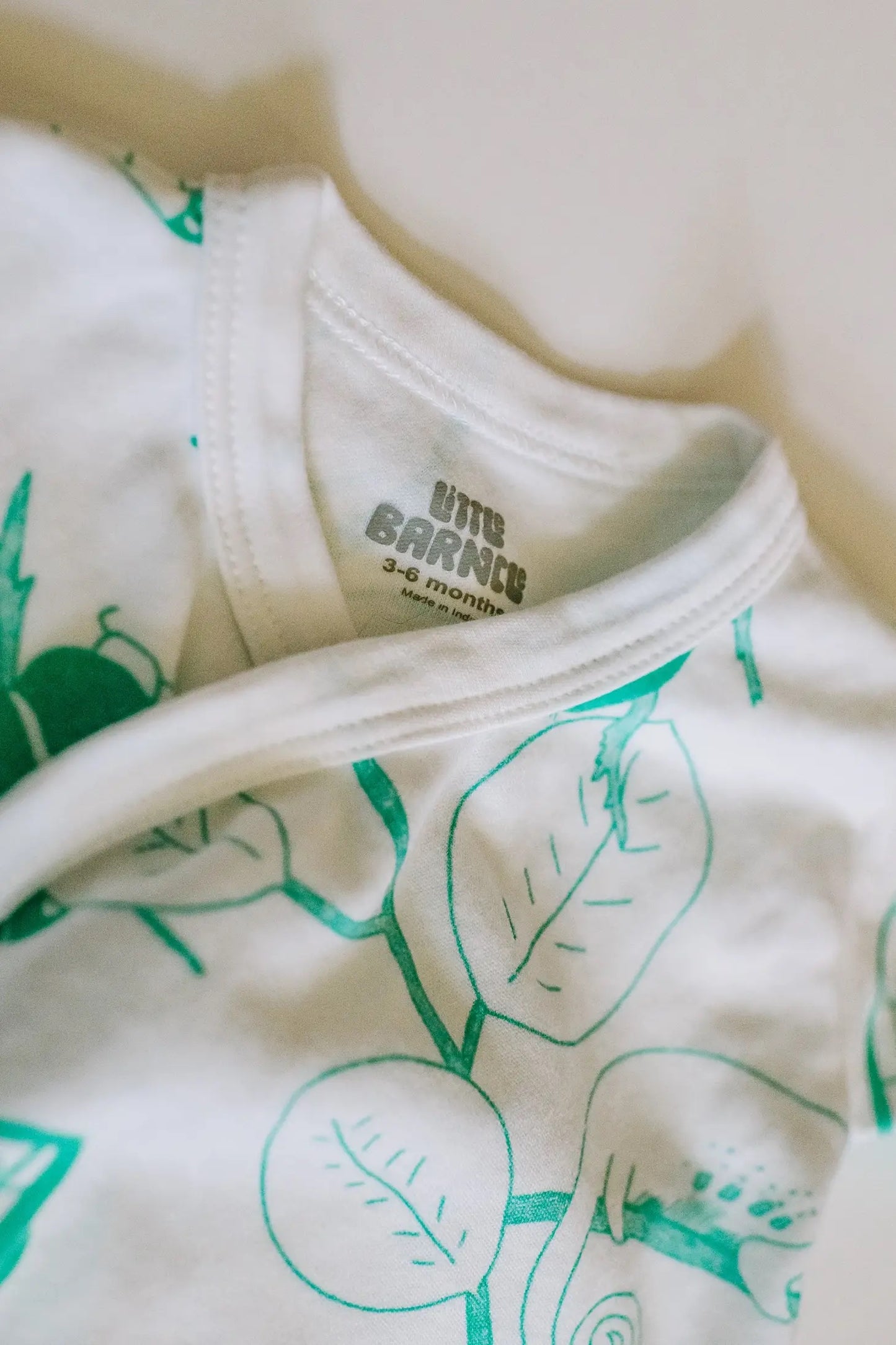 Bug baby bodysuit detail