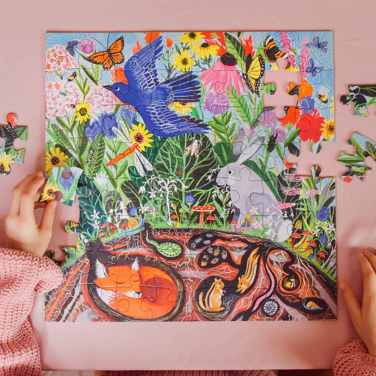 Wild Things 64 piece puzzle on a pink table
