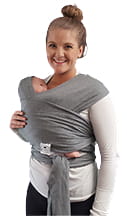 Person wearing a gray baby wrap carrier on a white background