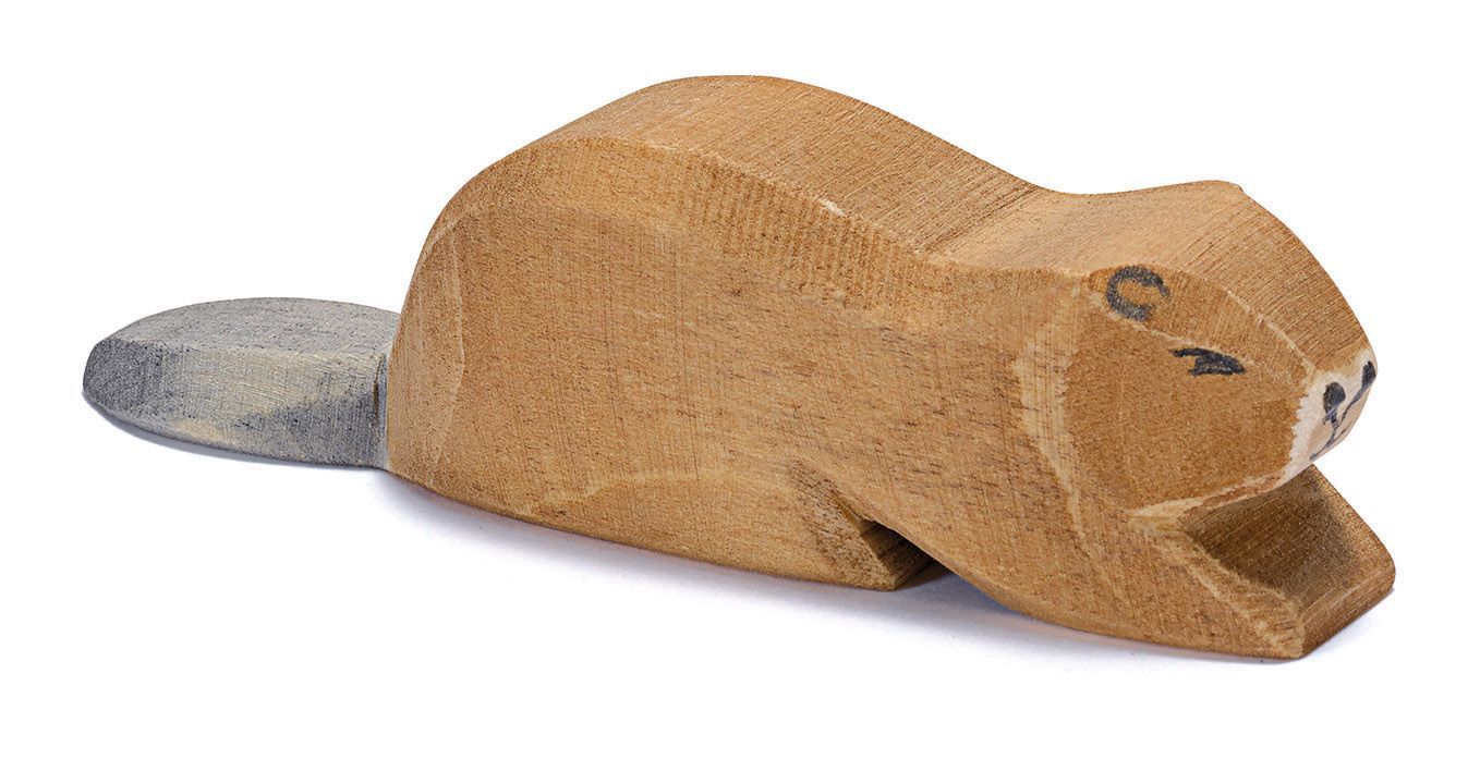 Wooden beaver lying by Ostheimer