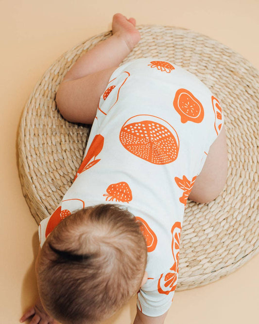 Baby crawling wearing fruit baby bodysuit