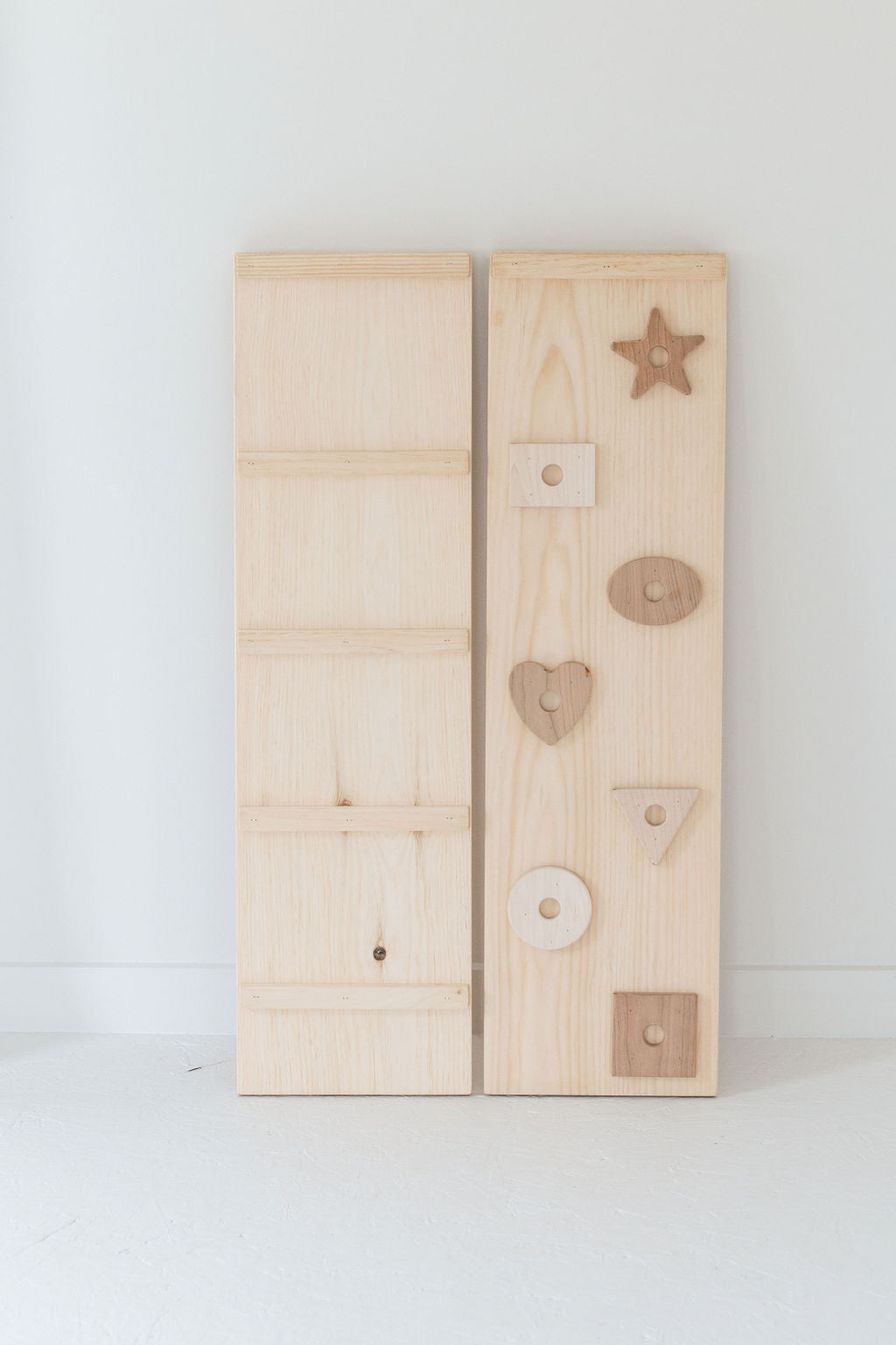 Wooden board with cut-out shapes on a white background