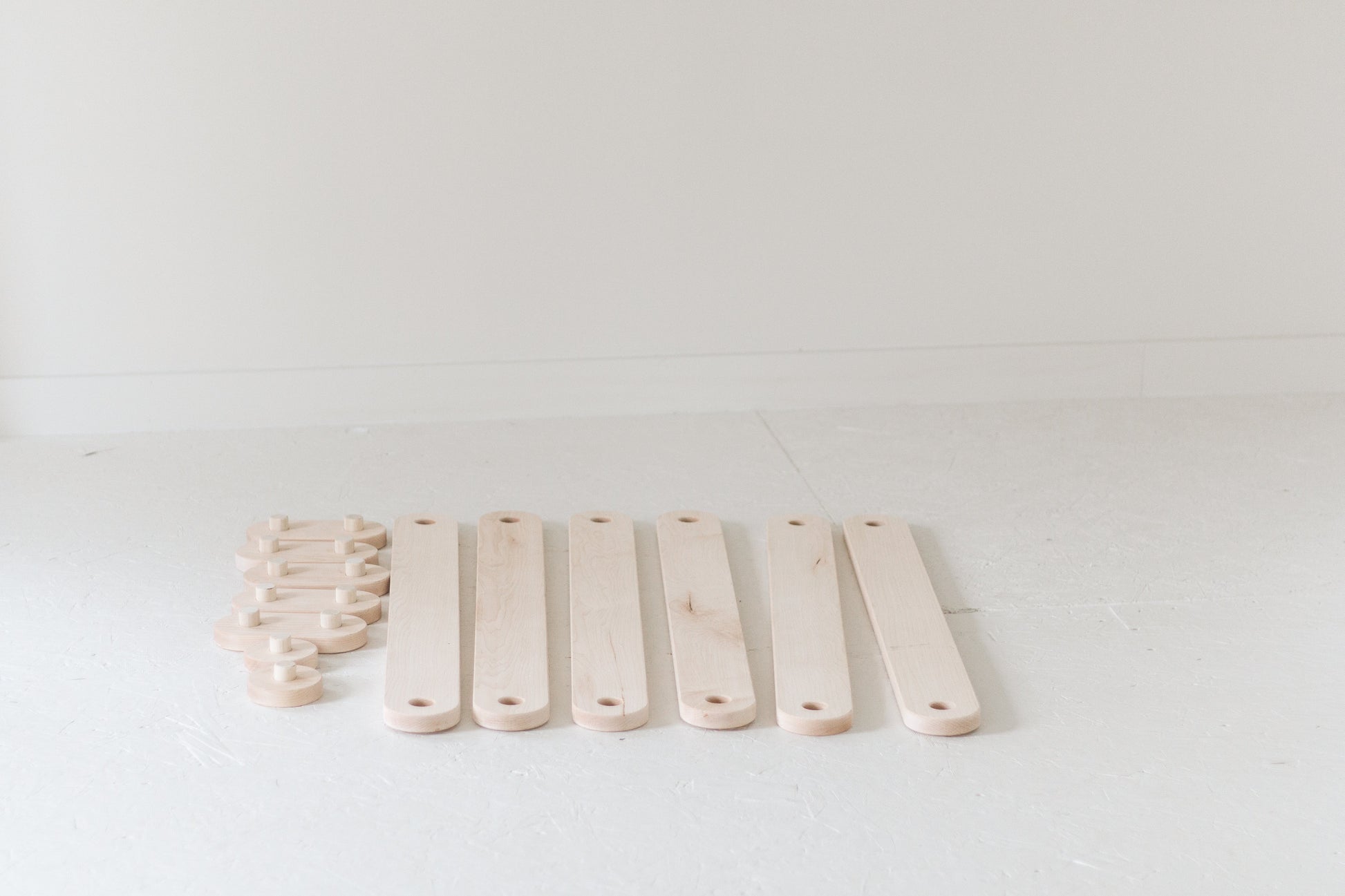 Set of wooden popsicle sticks on a white background