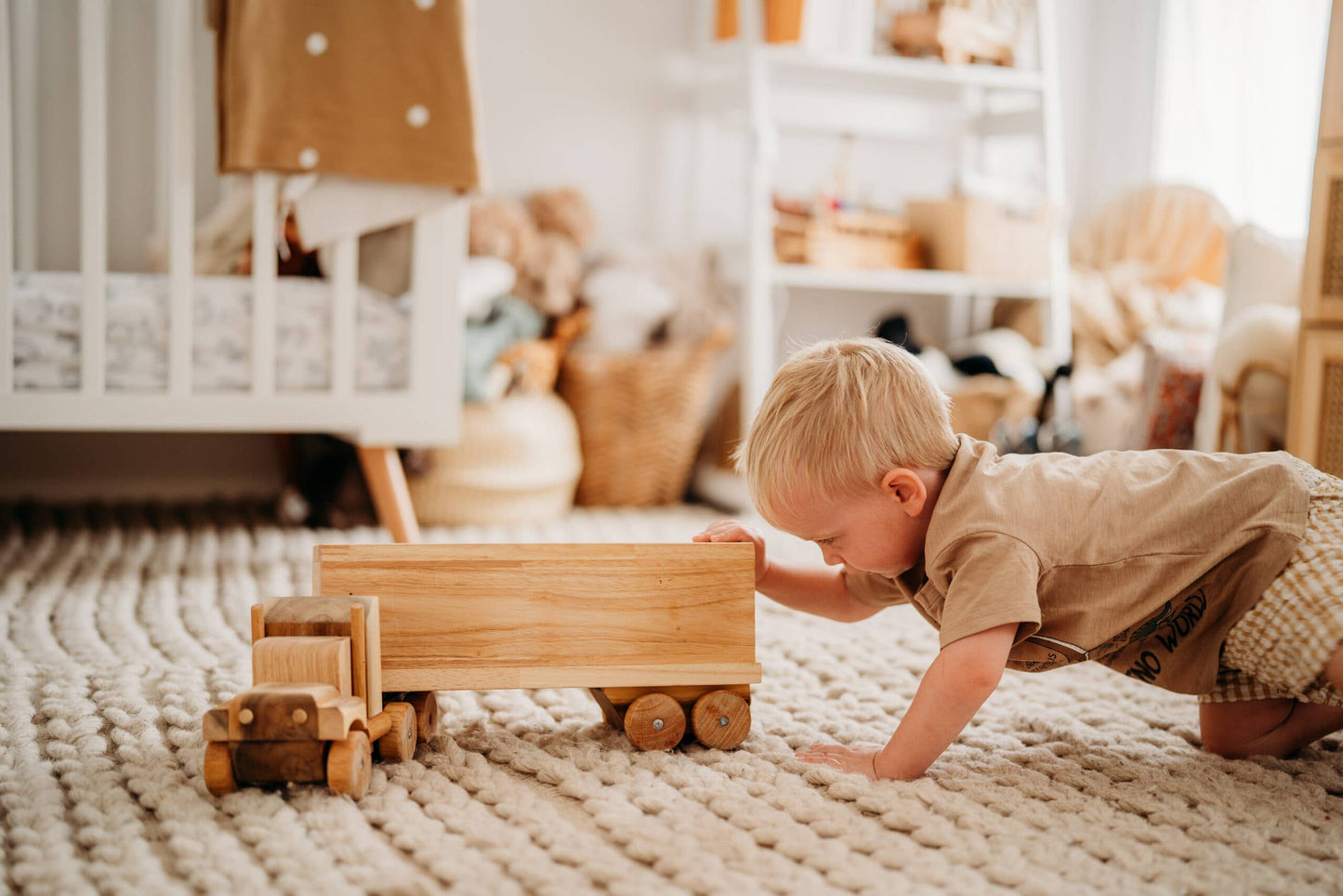 Child pushing Wood_Cargo_truck_ in a sunny child room
