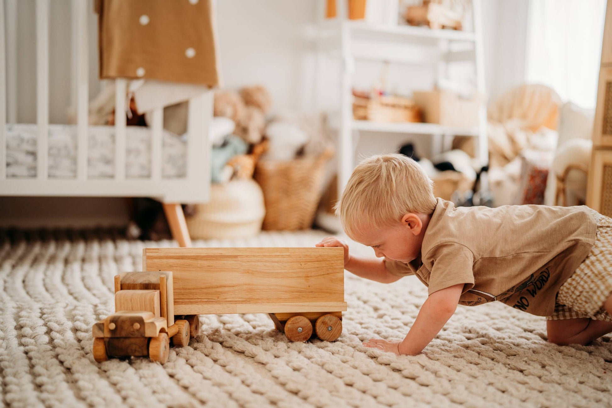 Child pushing Wood_Cargo_truck_ in a sunny child room
