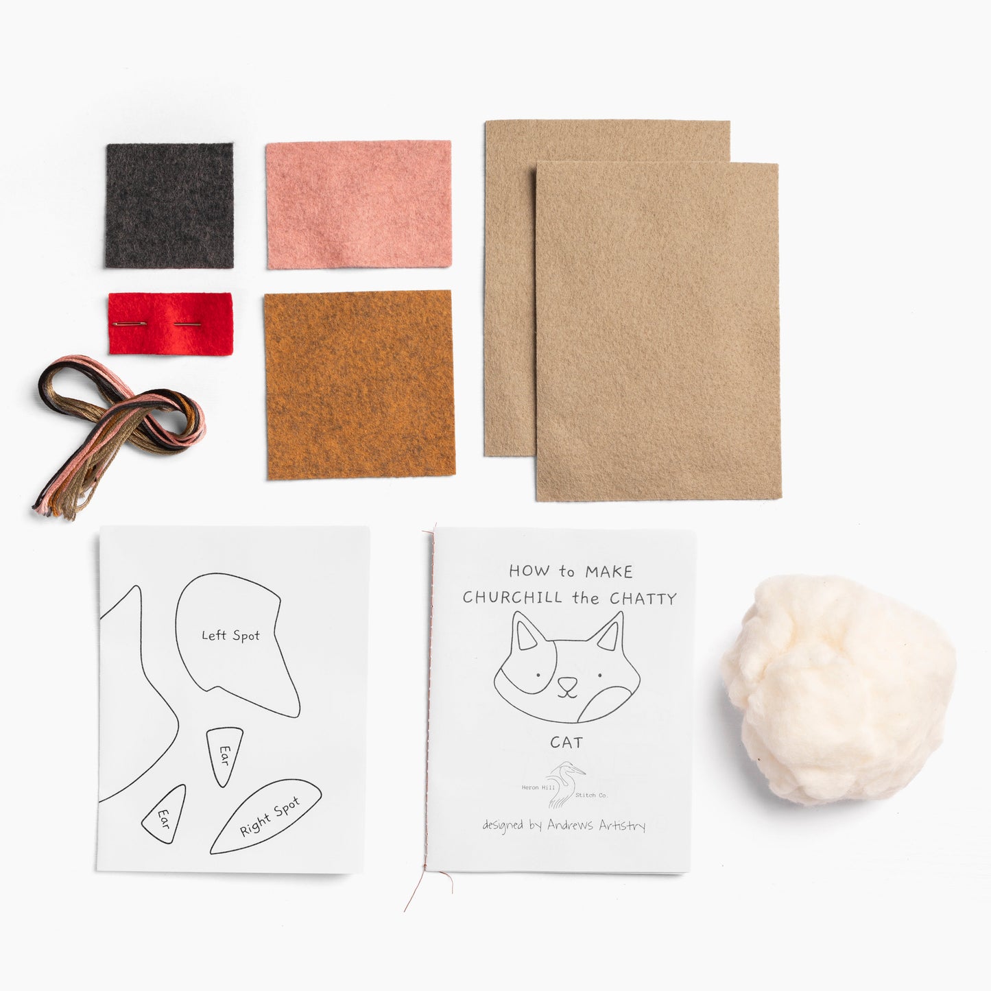 Cat toy-making kit with felt pieces, cardboard, and instructions on a white background