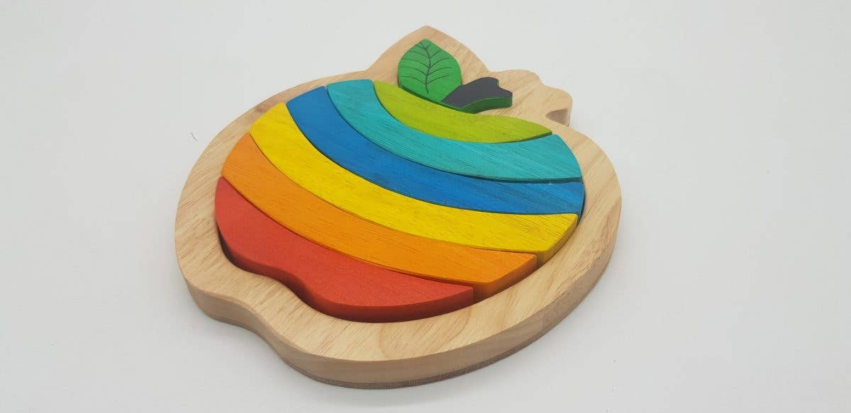 Wooden apple-shaped puzzle with rainbow colors on a white background