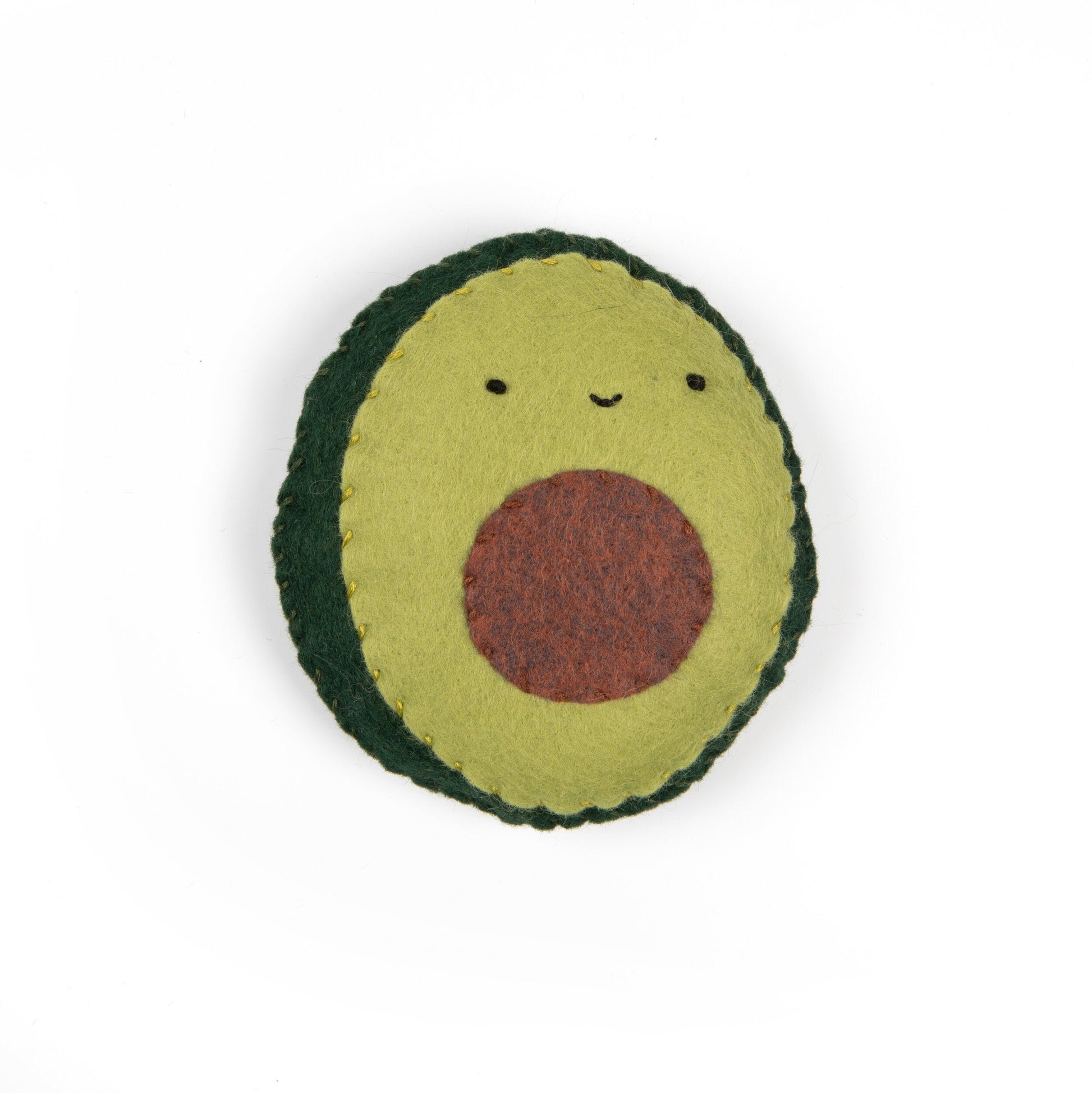 Plush avocado toy with a smiling face on a white background
