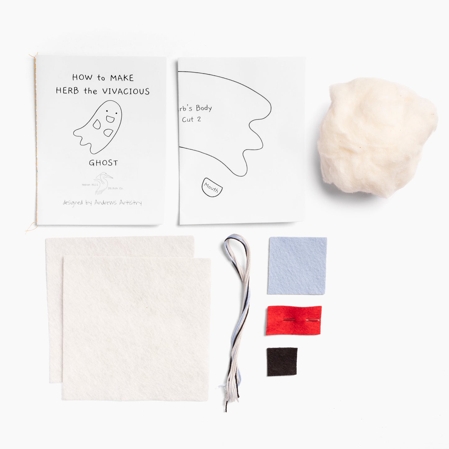 Ghost costume-making kit with templates, fabric, and accessories on a white background