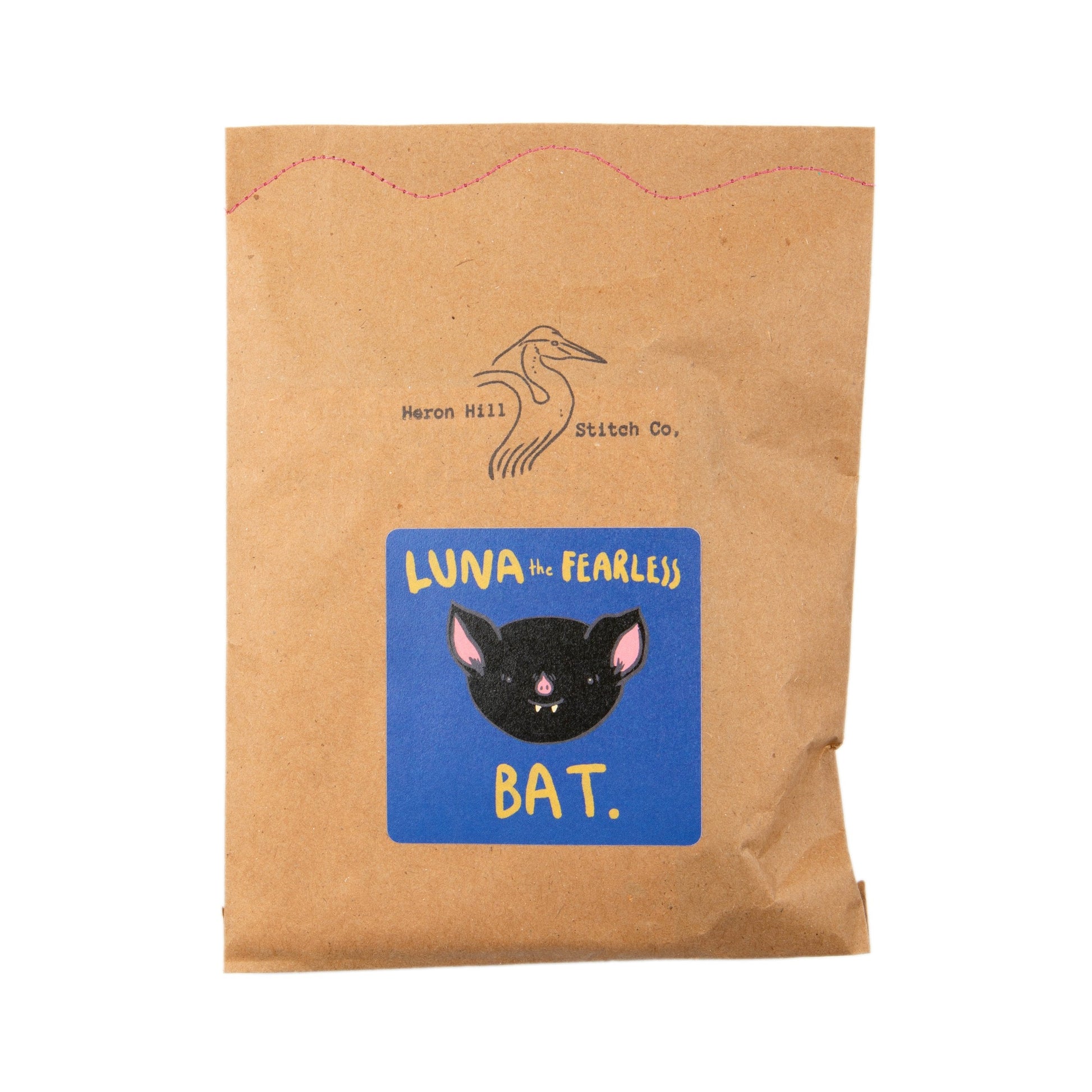 Kraft paper package with a bat illustration and text on a white background