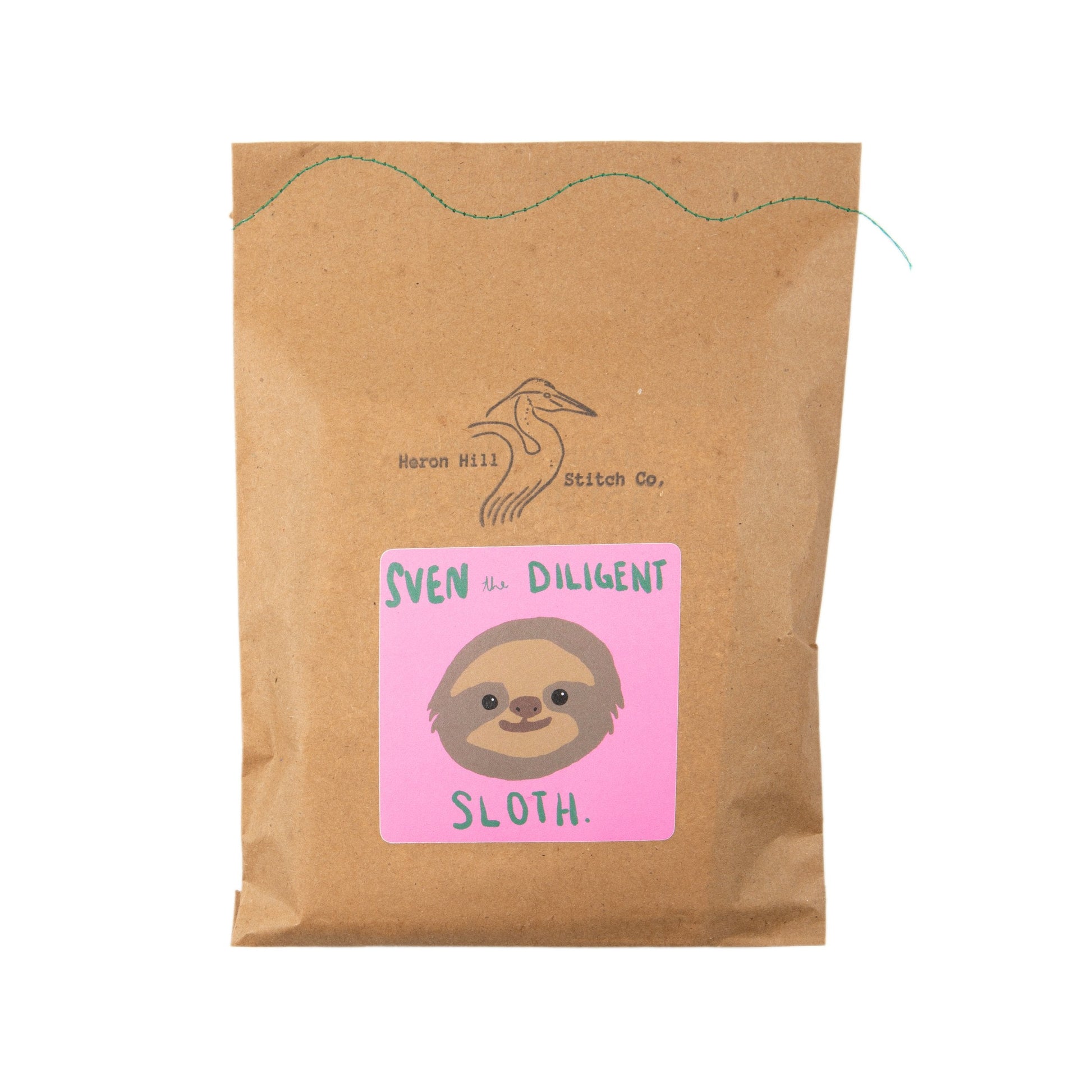 Kraft paper package with a sloth illustration and text on a white background