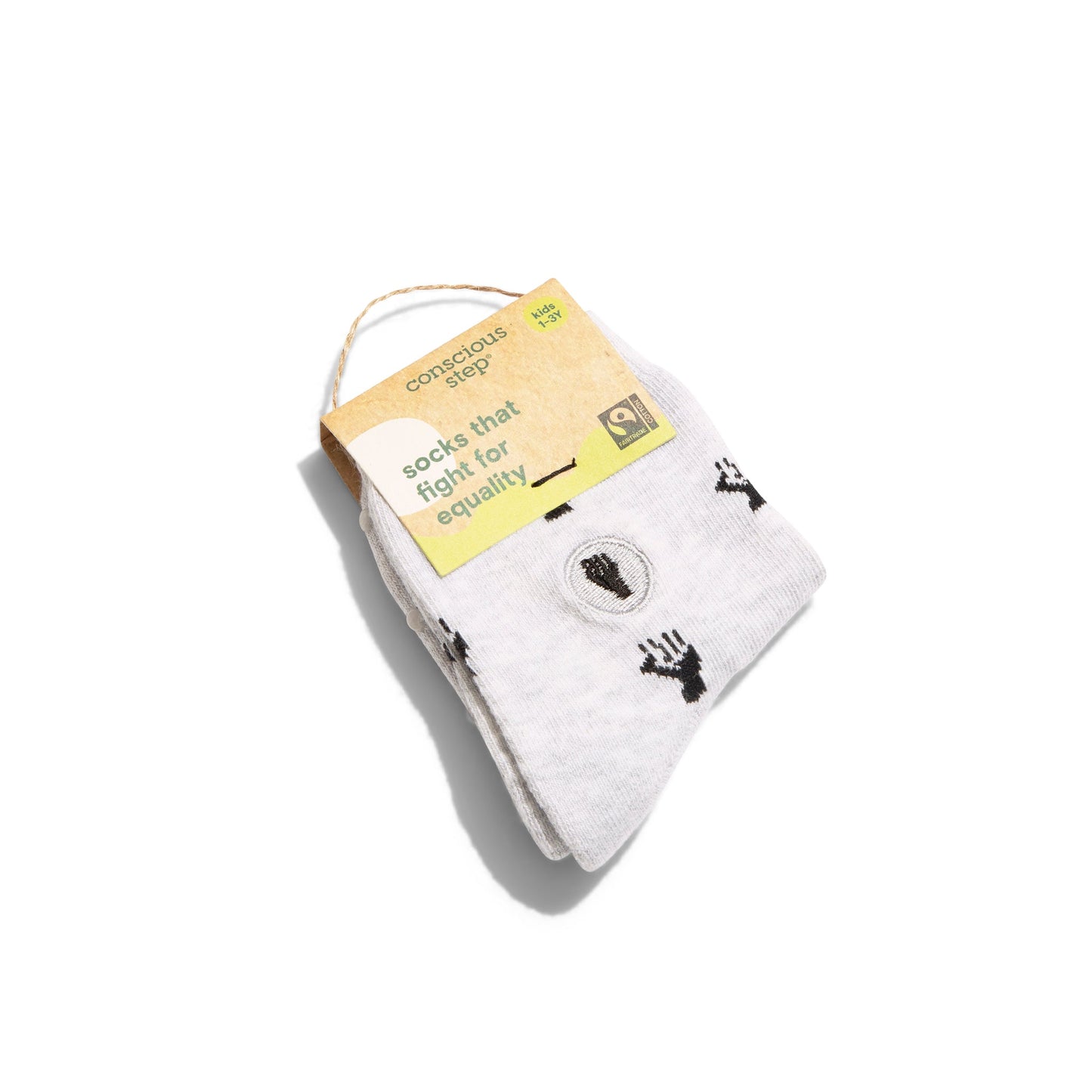 White socks with black handprints on a white background