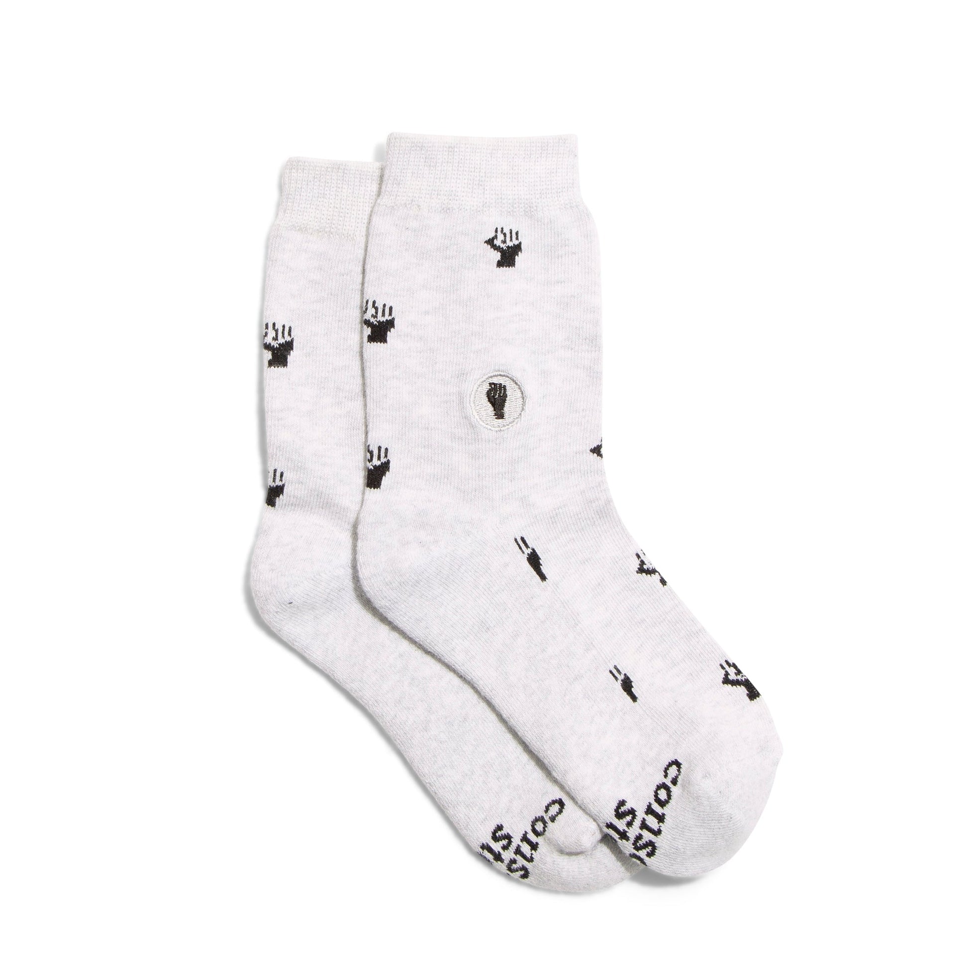White socks with black designs and text on a white background