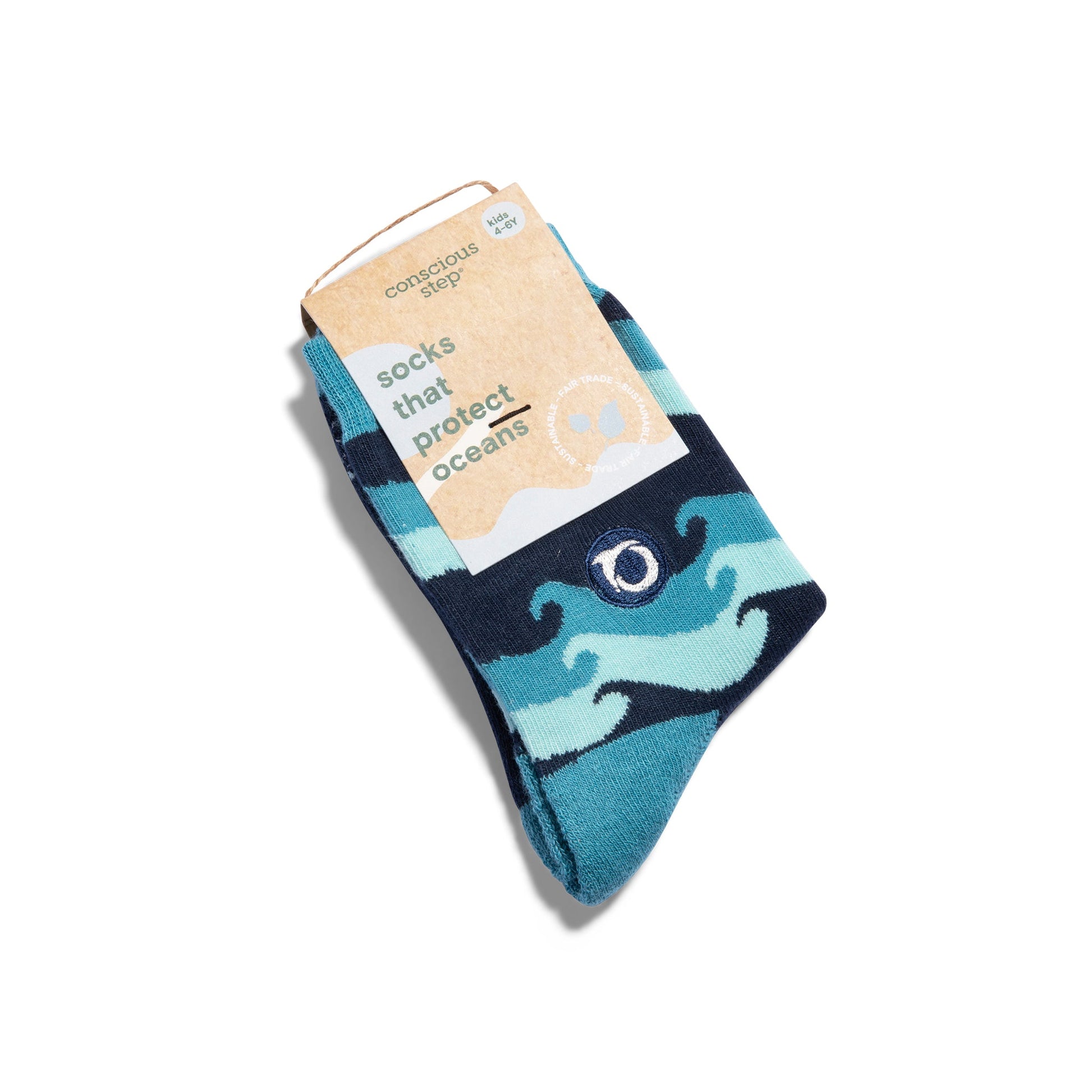 Blue and green patterned sock with a cardboard tag on a white background