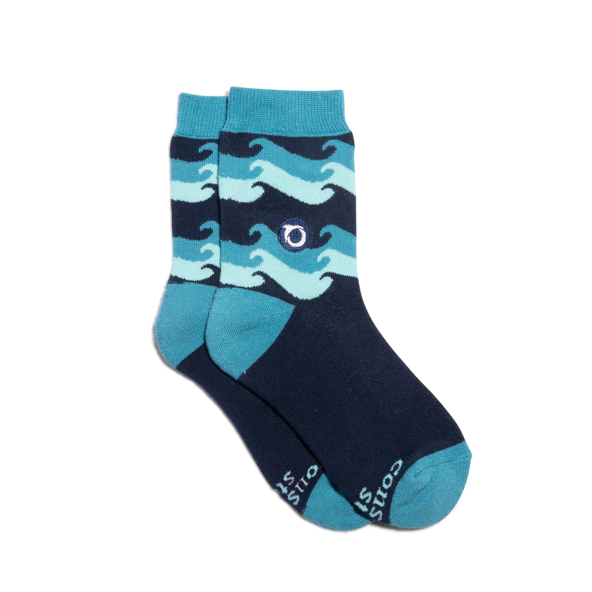 Navy and teal socks with wave pattern on a white background