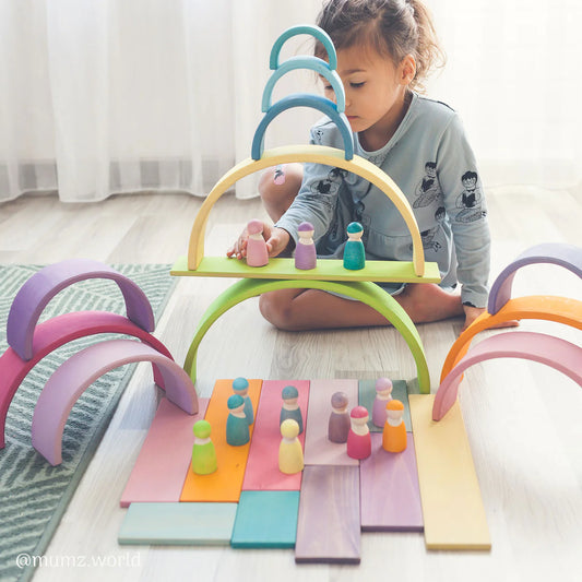 Child playing in a sunlit room with a Large Pastel Arch 