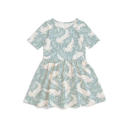 Children's dress with mermaid pattern on a light blue background
