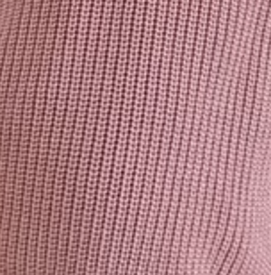 Close-up of pink textured fabric sweater