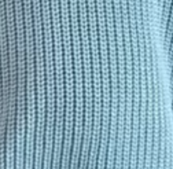 Close-up of a textured blue fabric pattern
