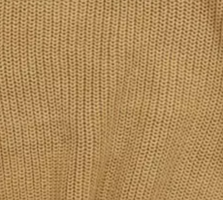 Close-up of a beige fabric texture