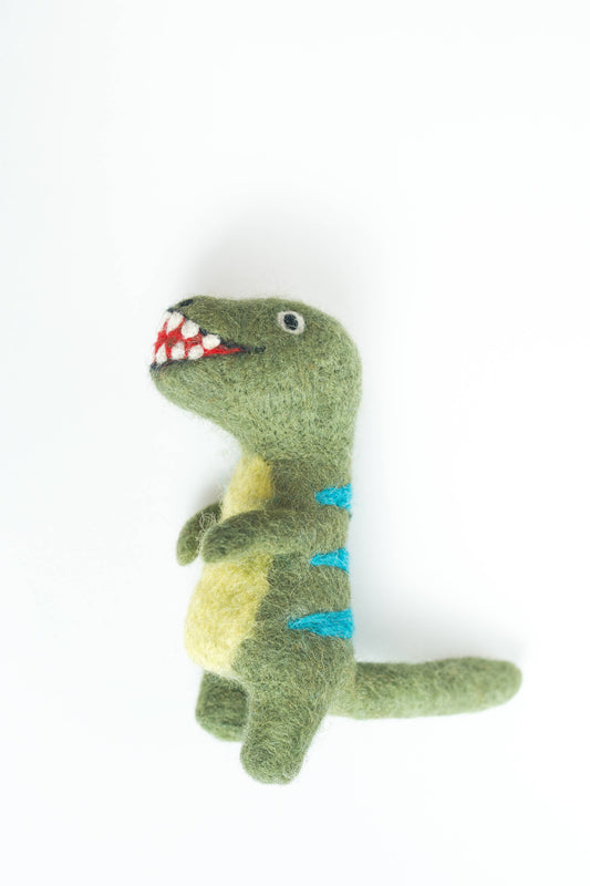 Green dinosaur plush toy with blue spikes on a white background