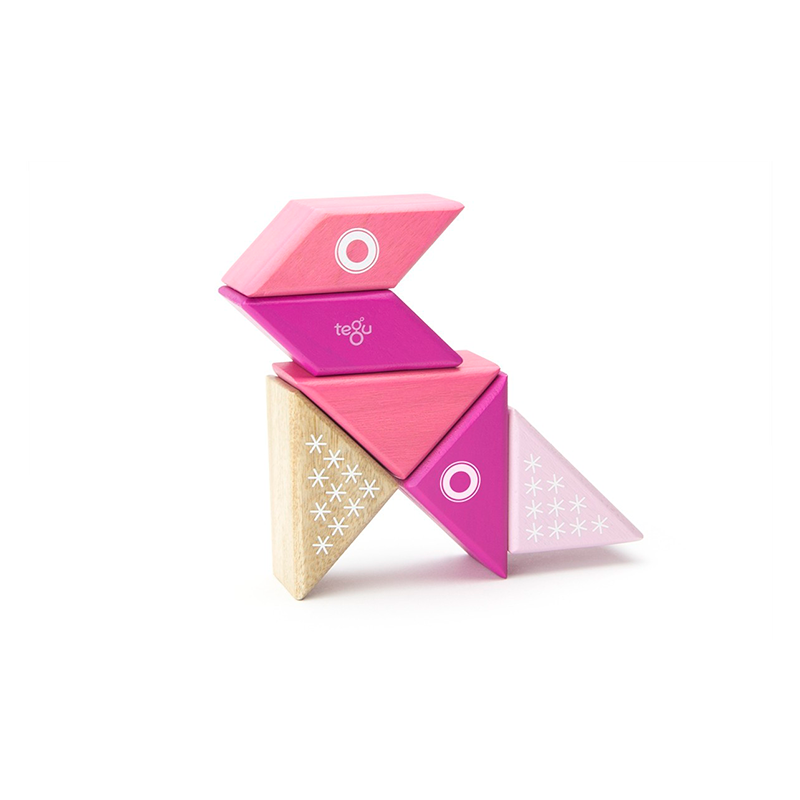 Pink and beige geometric blocks stacked on a white background