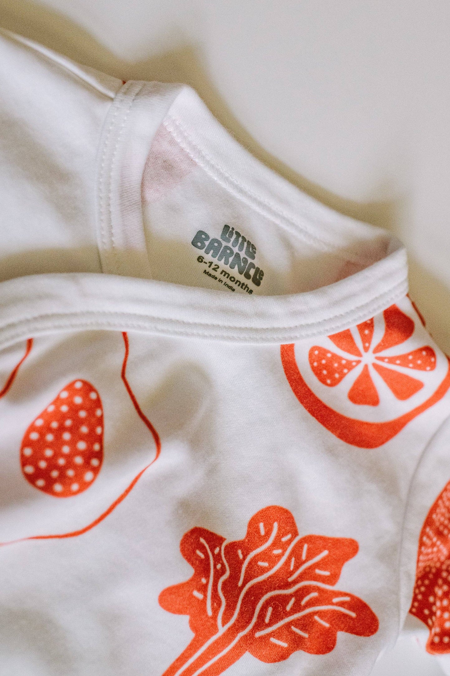 Fruit baby bodysuit detail