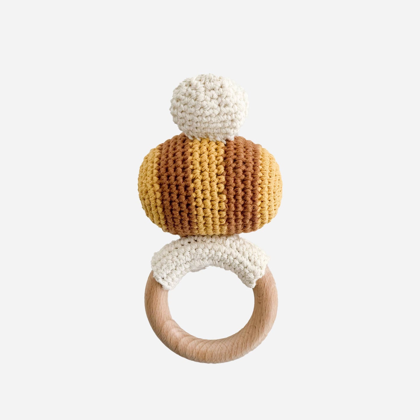 Crocheted bee teether with wooden ring on a white background