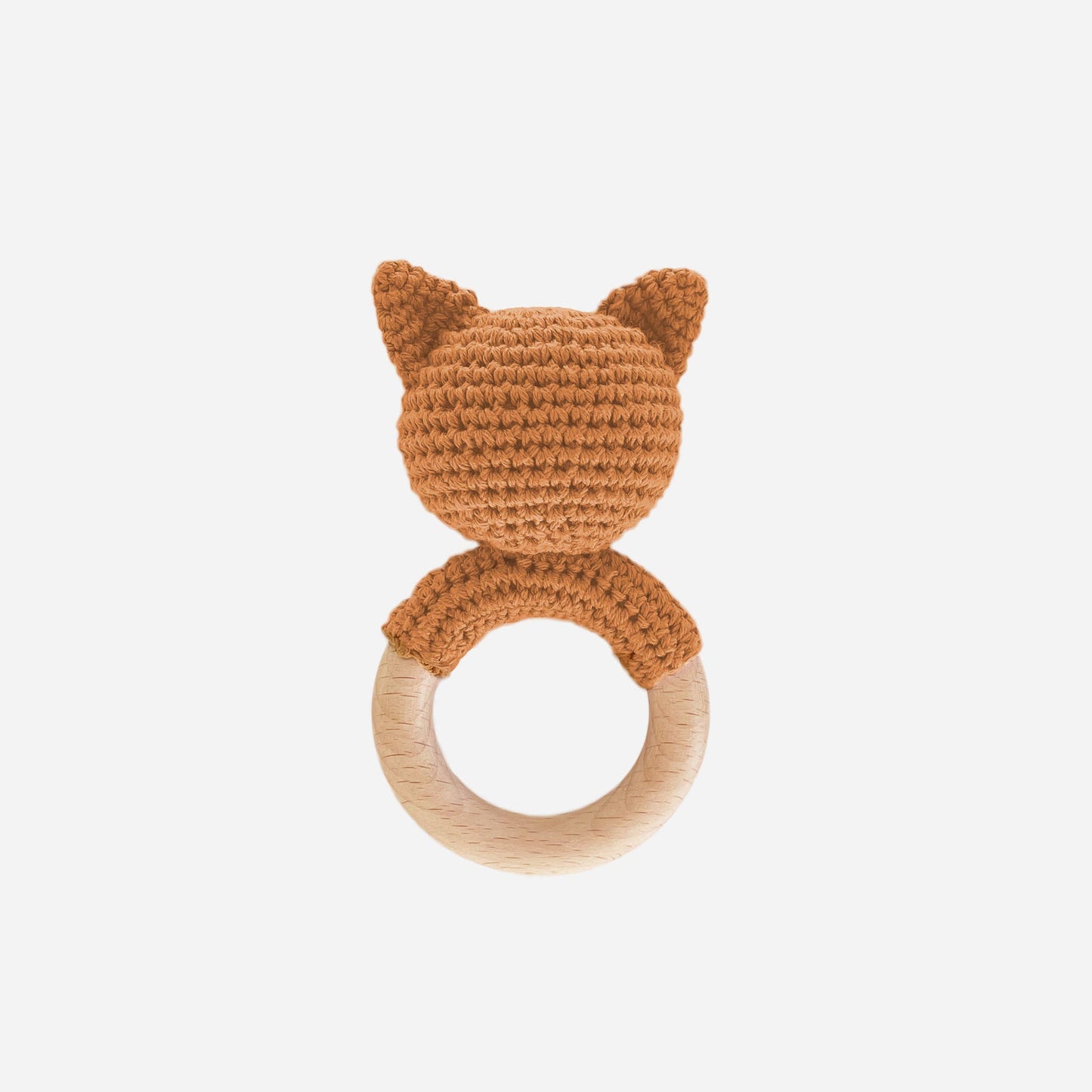 Crocheted fox-shaped teething ring on a white background