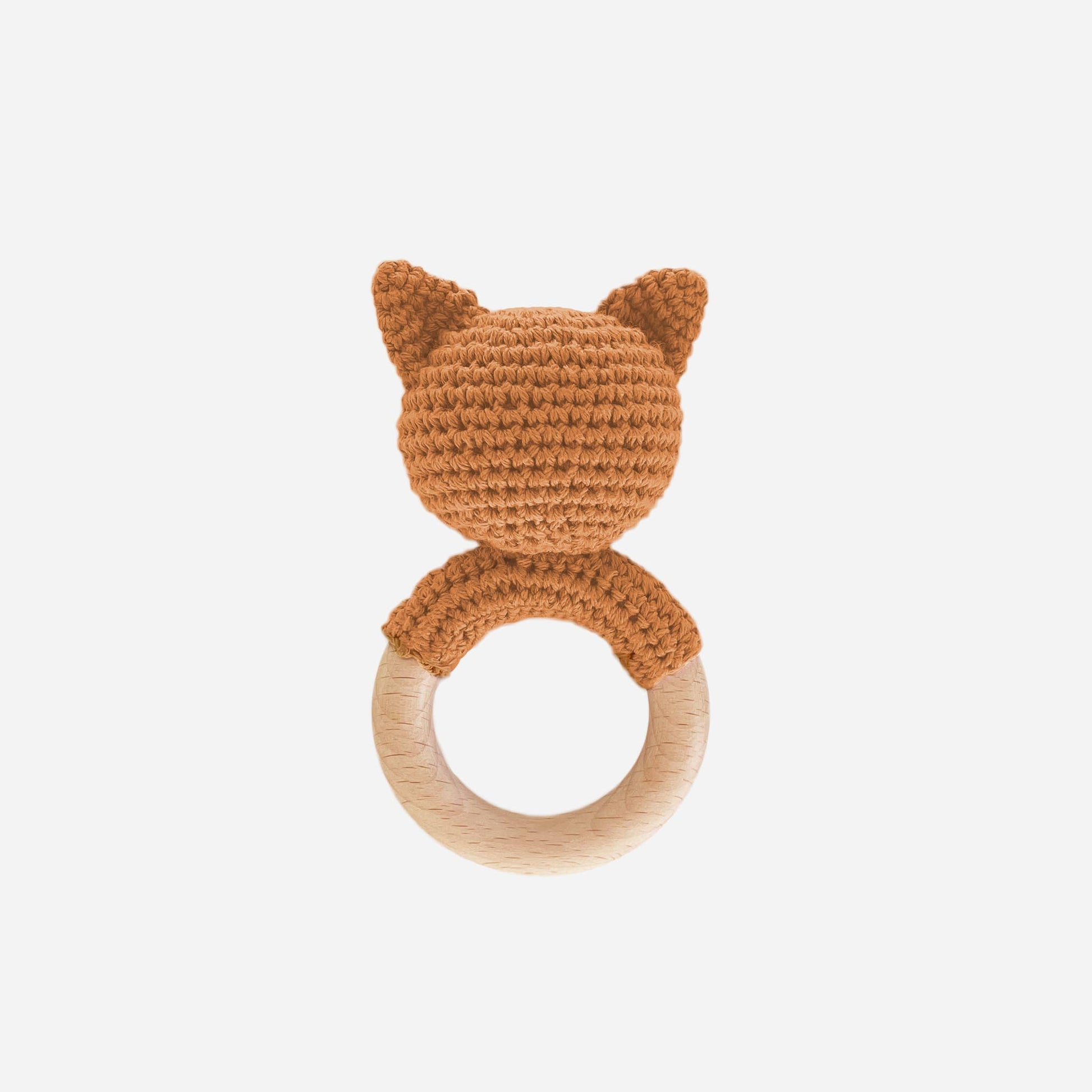 Crocheted fox-shaped teething ring on a white background