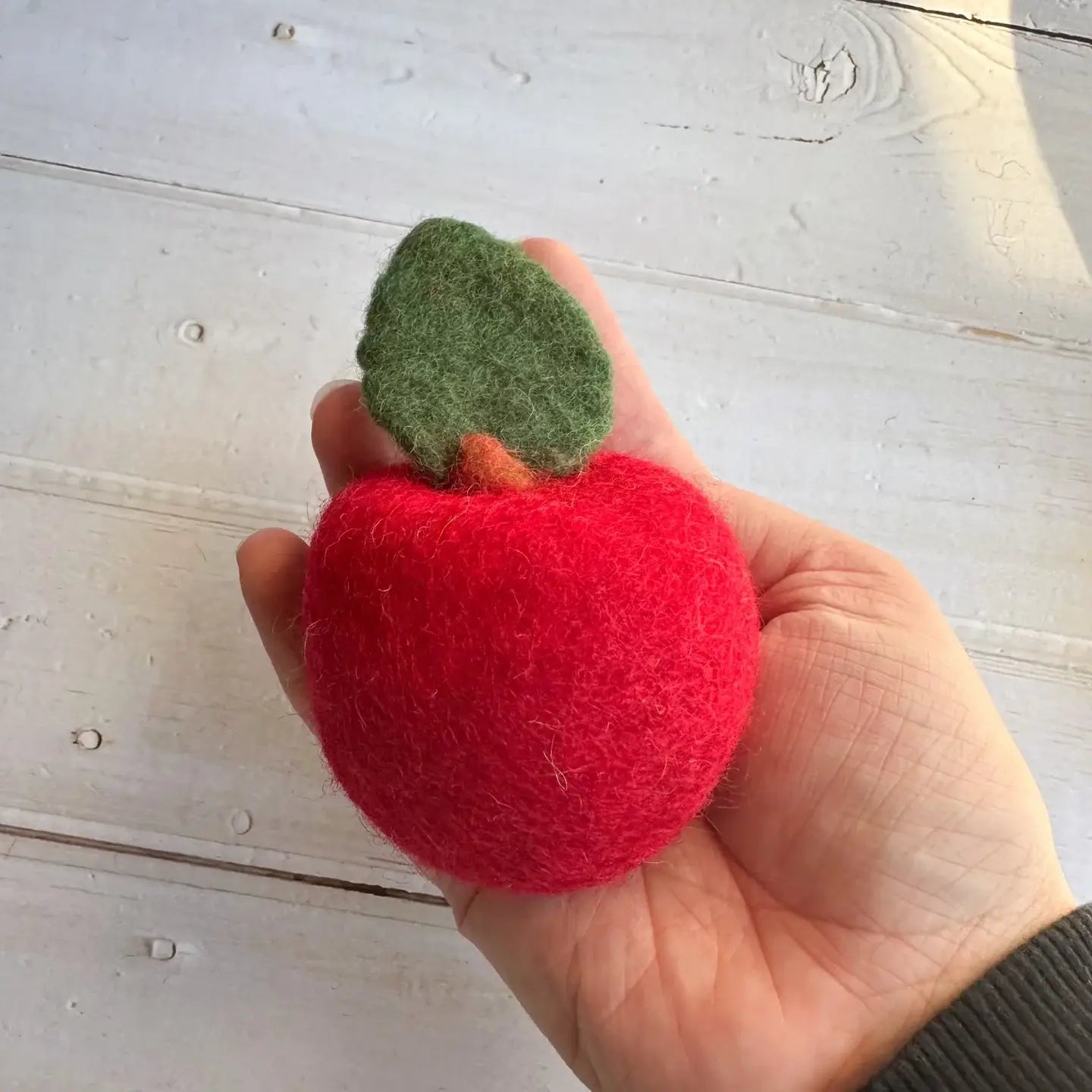 large red felt apple