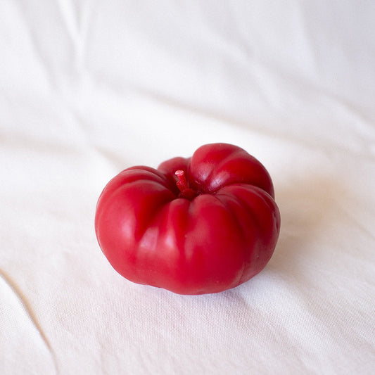 Red fruit on a white fabric background