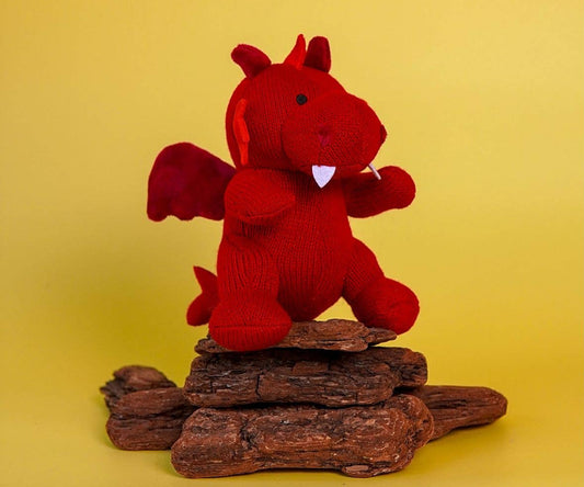 Red dragon knitted baby rattle