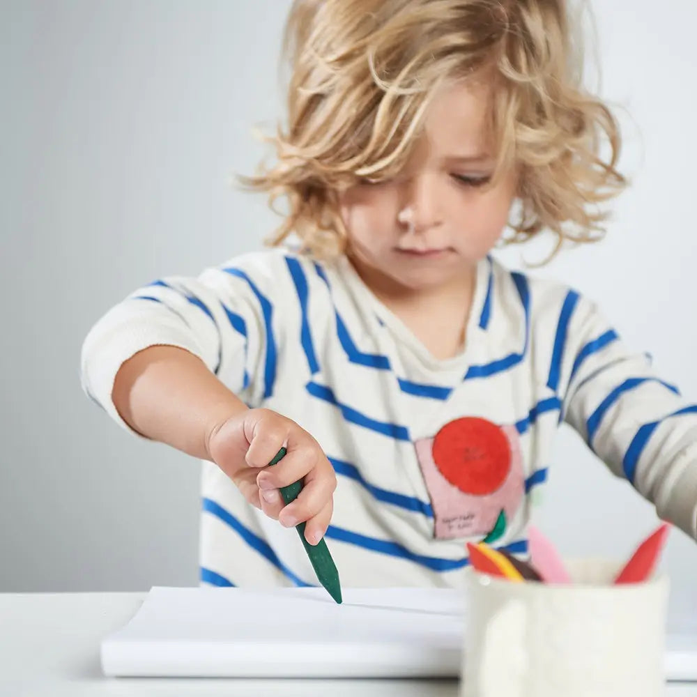 Child drawing on art pad by ecokids