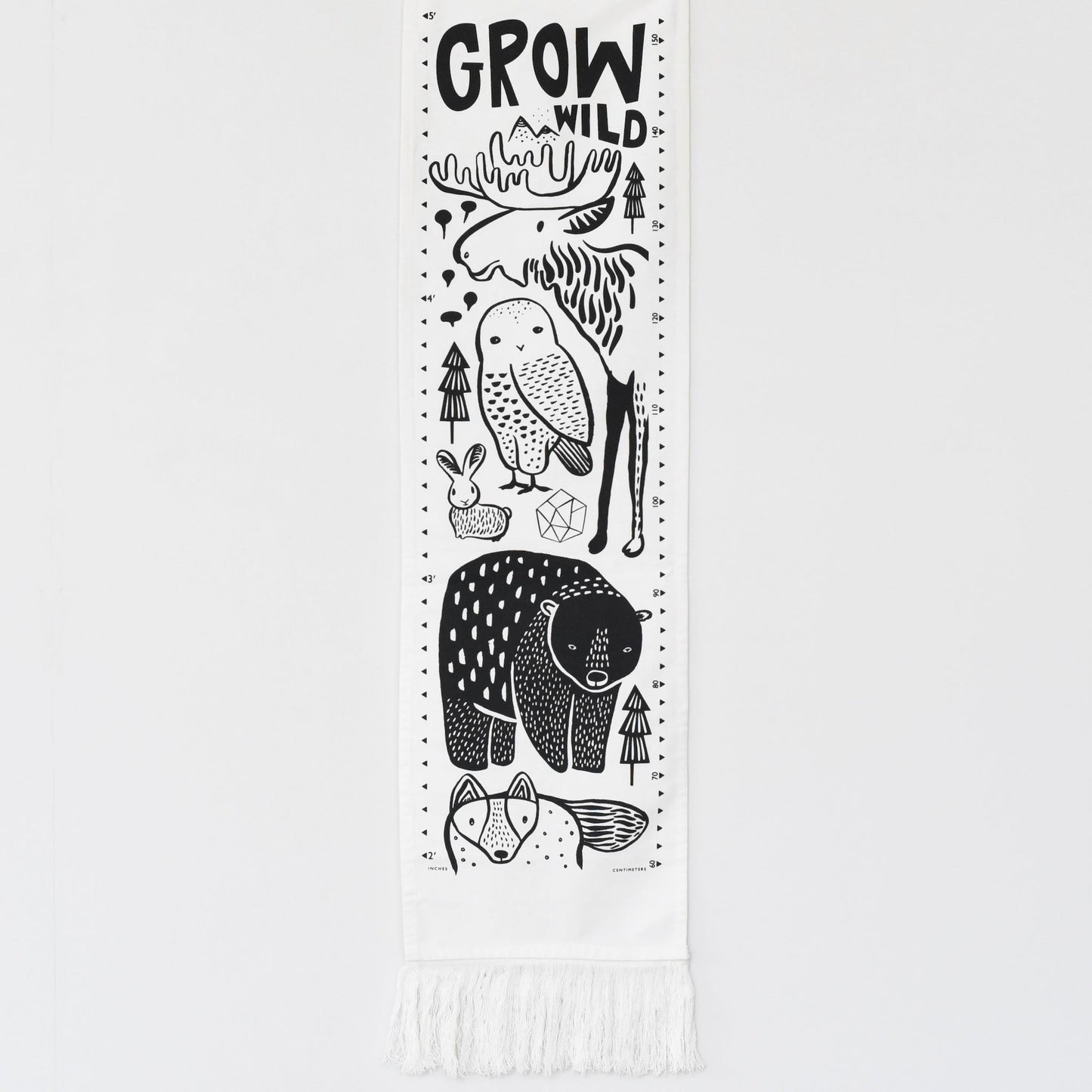 Growth chart with black animal illustrations and 'Grow Wild' text on a white background