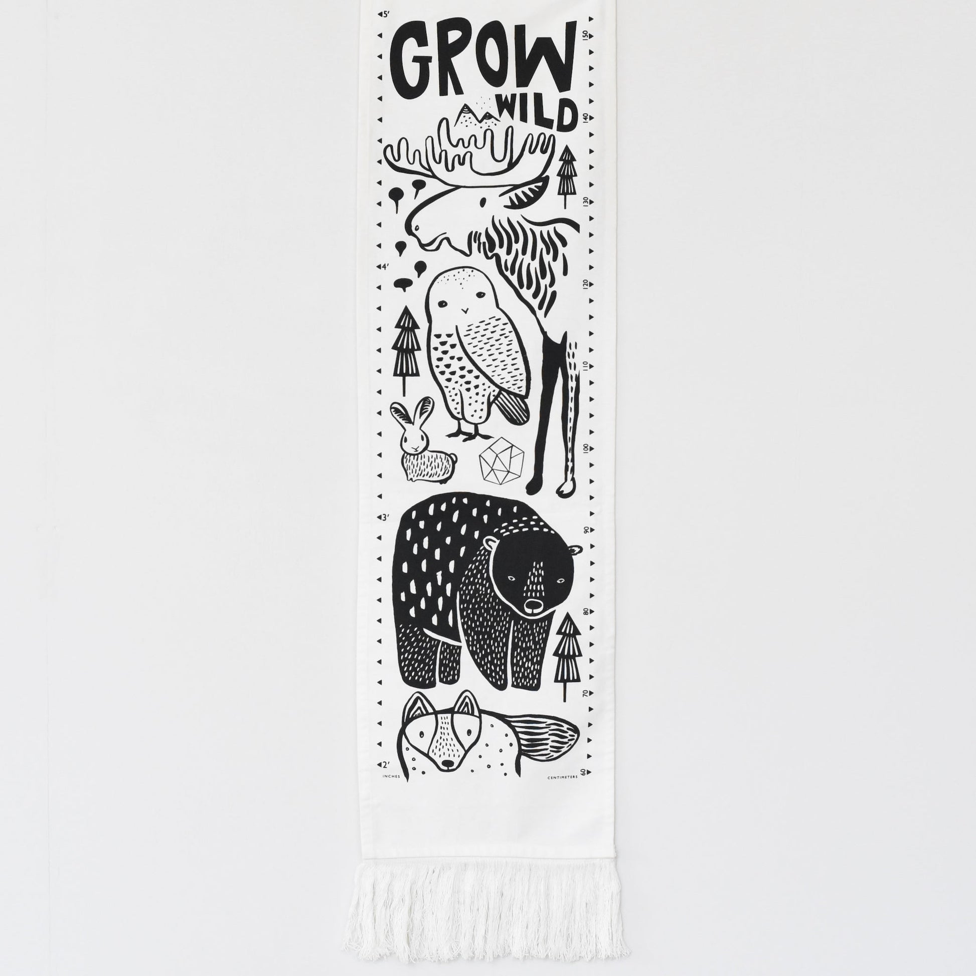 Growth chart with black animal illustrations and 'Grow Wild' text on a white background
