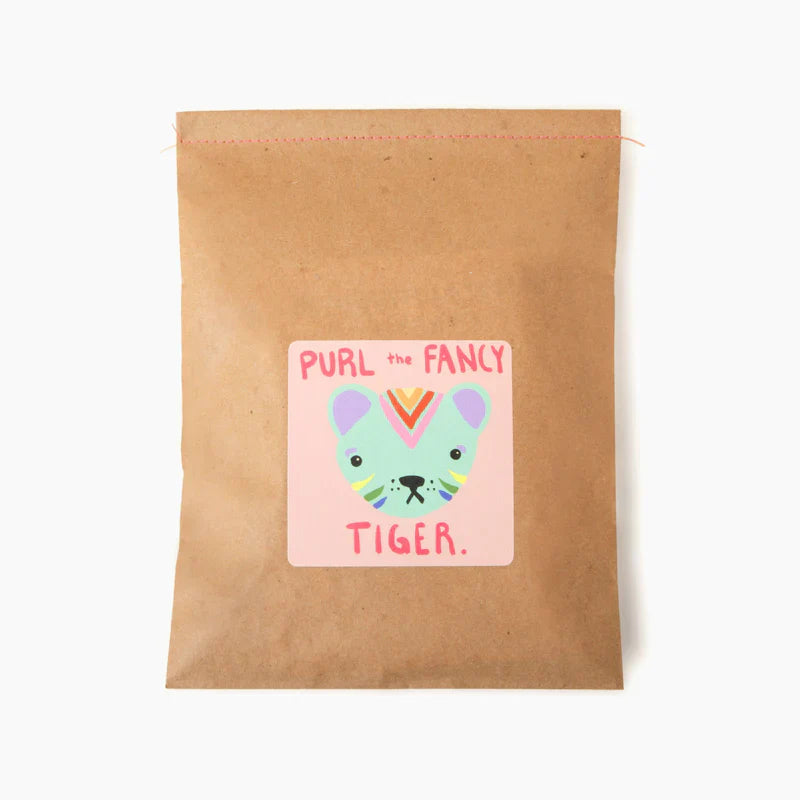 Kraft paper pouch with a colorful tiger illustration and text on a white background