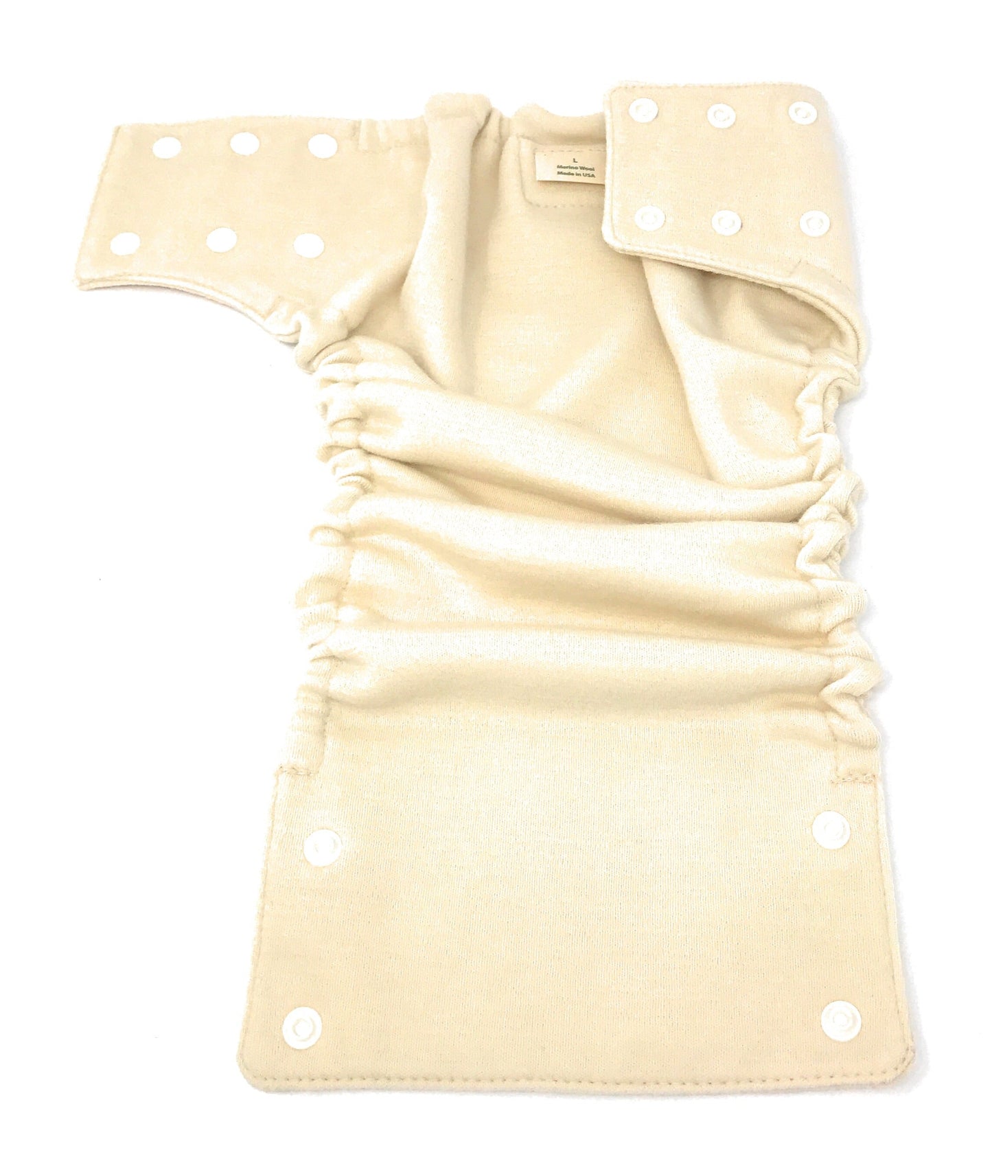 Beige baby wrap with white polka dots on a white background
