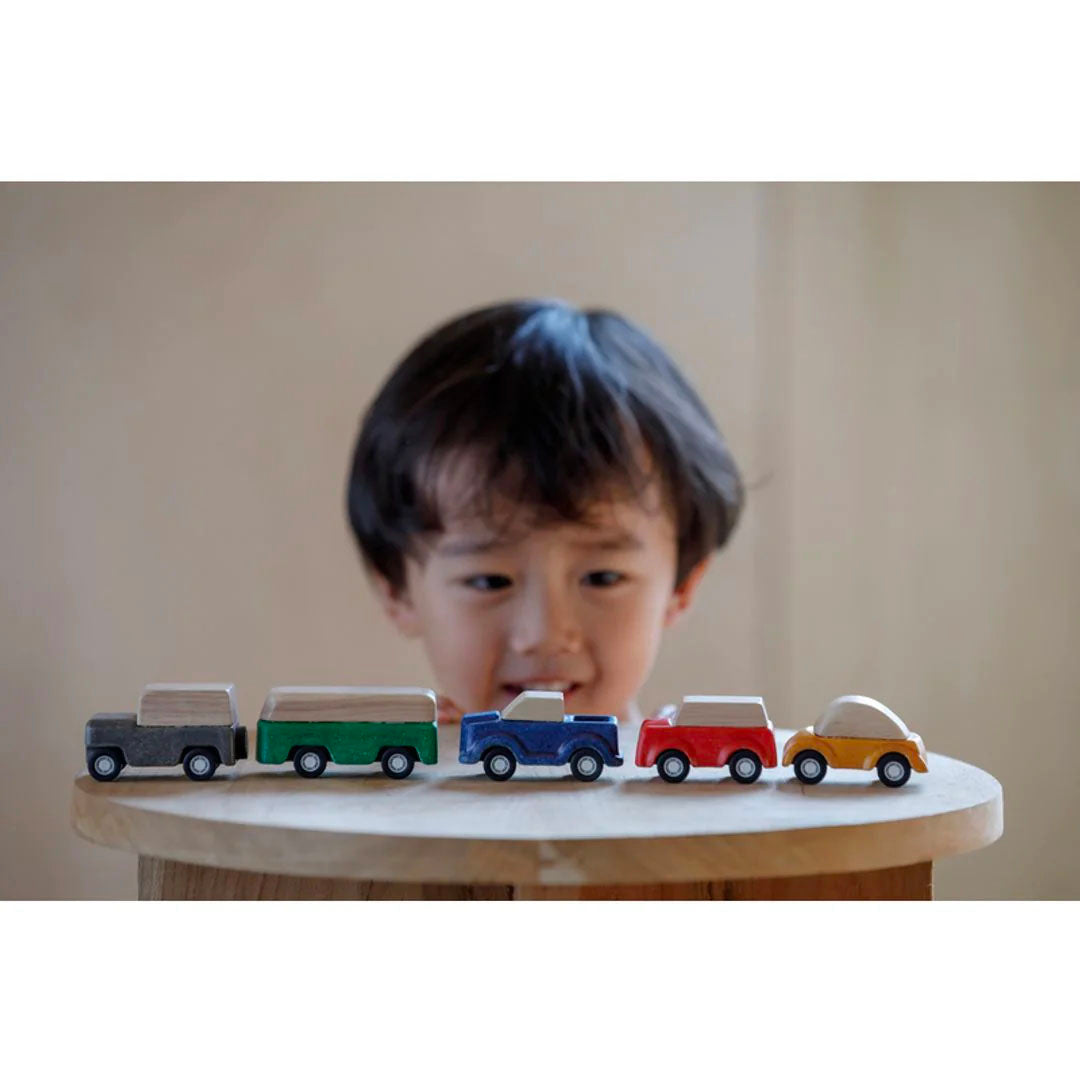 Child playing with PlanWorld Cars