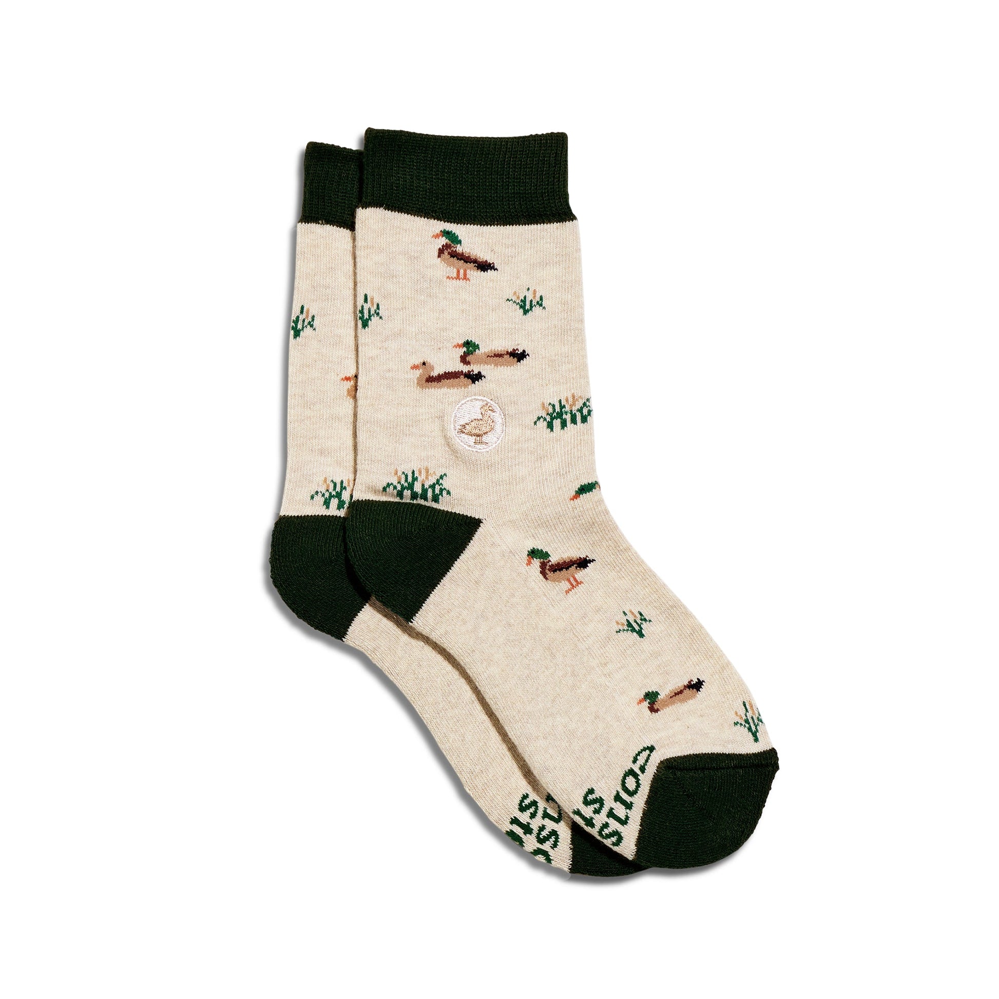 Beige socks with duck pattern on a white background