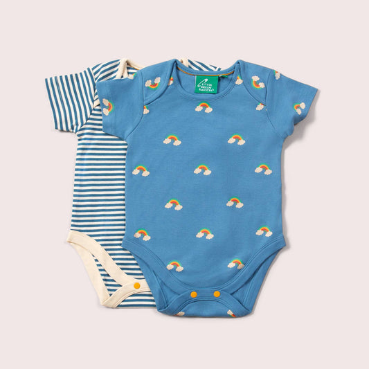 blue rainbows organic onesie set flat lay