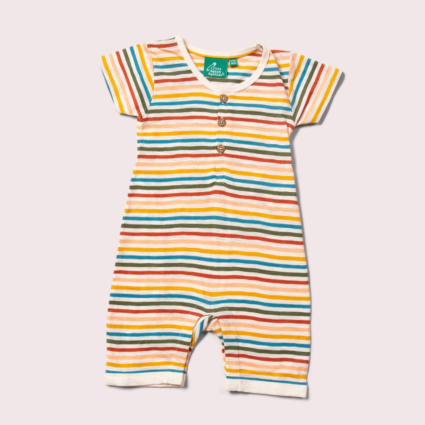 cream rainbow organic romper flat lay